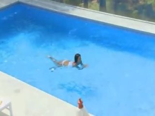 Big tits babe in swimming pool